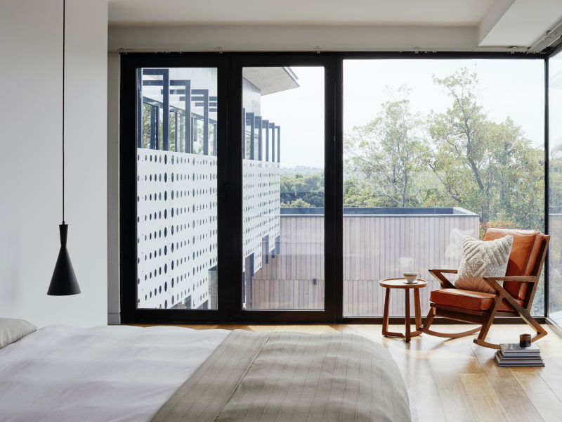 Wooden UPVC sliding window design for the bedroom - Beautiful Homes Wooden UPVC sliding window design for the bedroom - Beautiful Homes